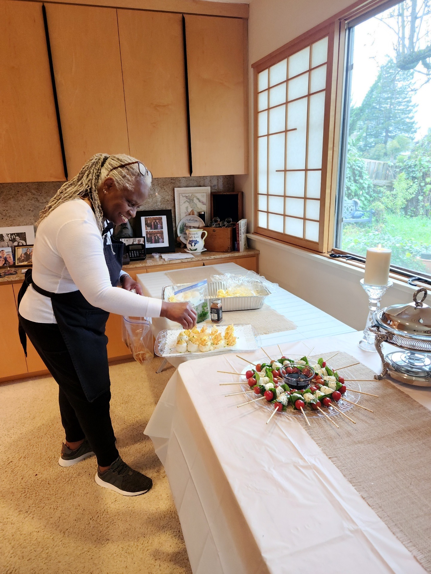 Po preparing fresh Creole dishes for an event